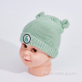 Topi warna hijau untuk bayi